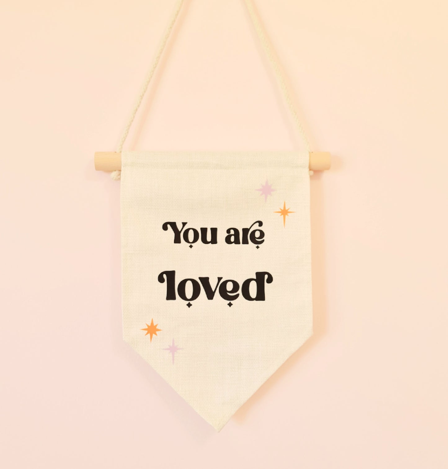 "You are loved" hanging banner
