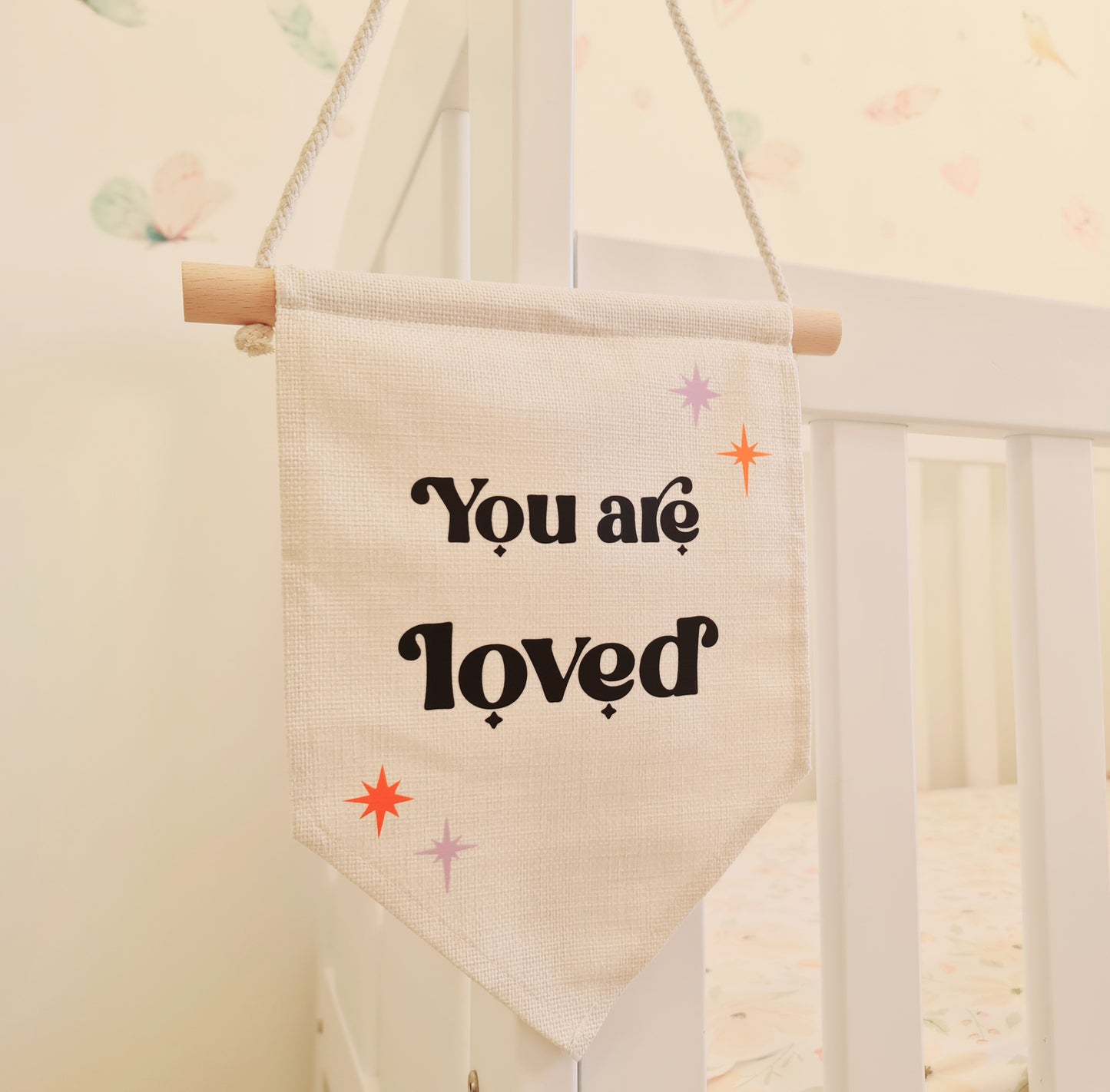 "You are loved" hanging banner