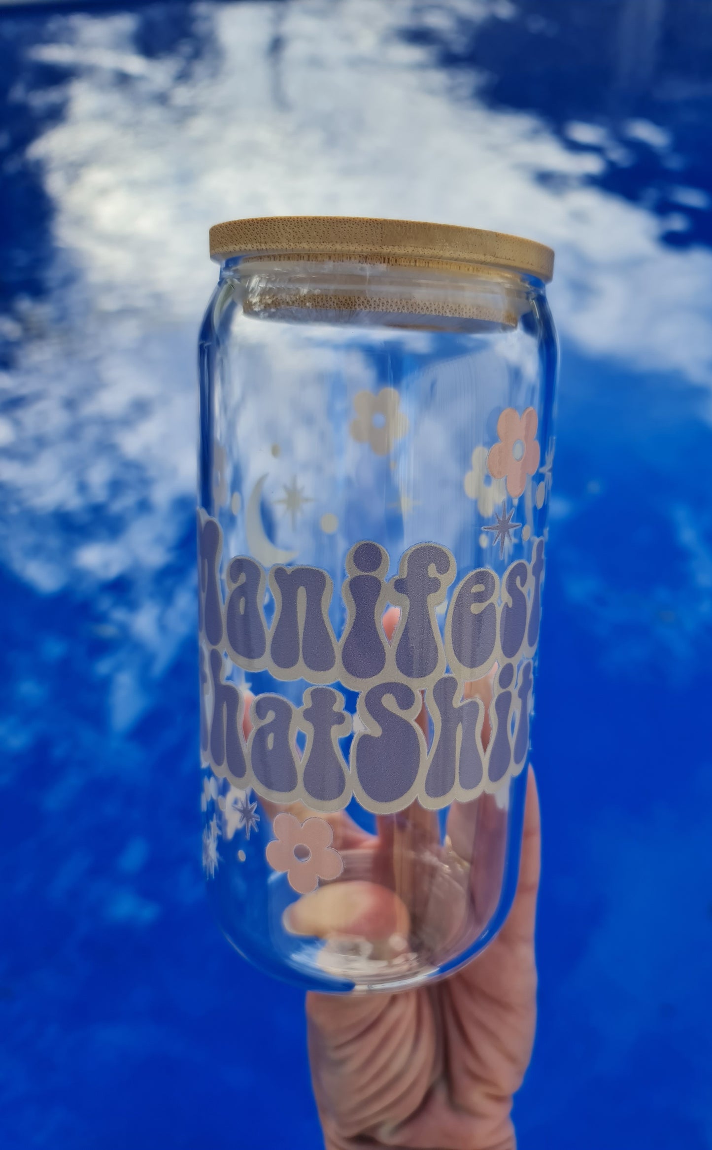 "Manifest that ..." glass cup