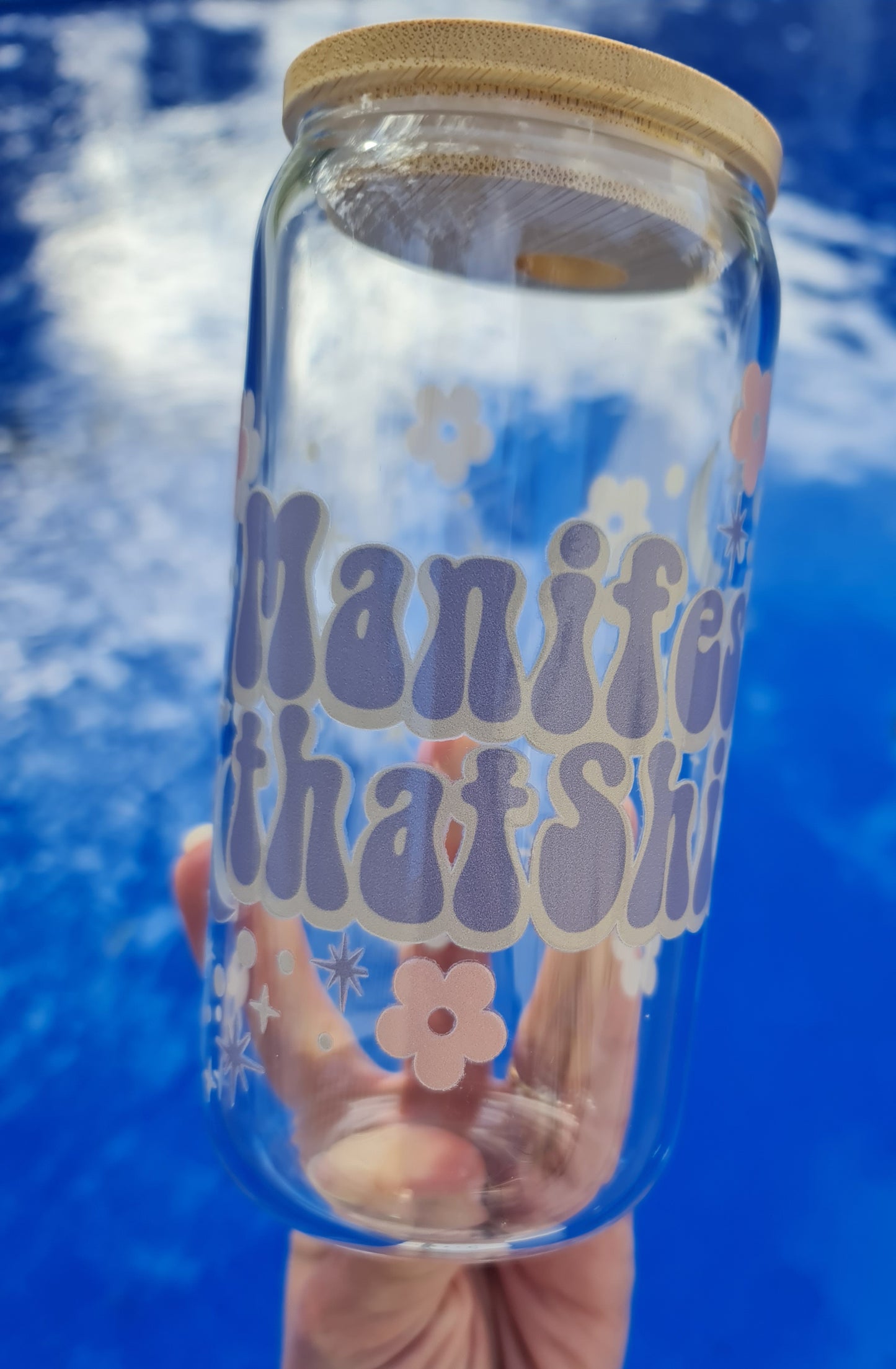 "Manifest that ..." glass cup