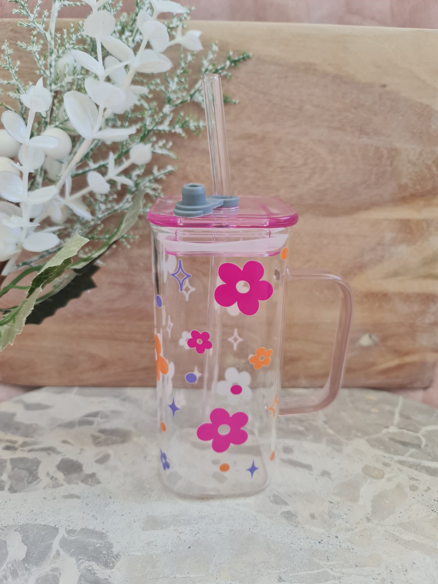 Floral glass cup with a handle