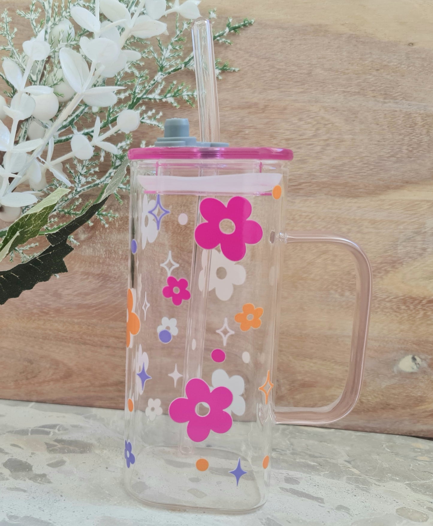 Floral glass cup with a handle