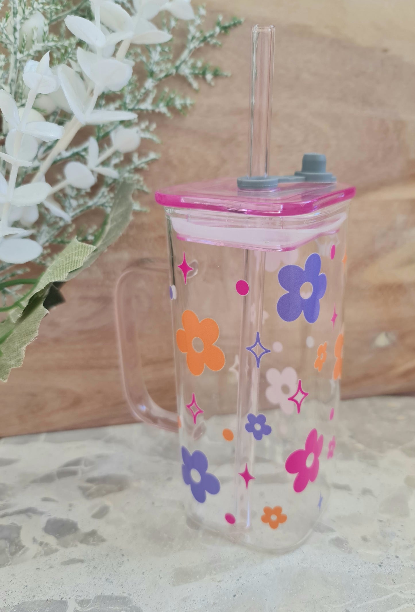 Floral glass cup with a handle
