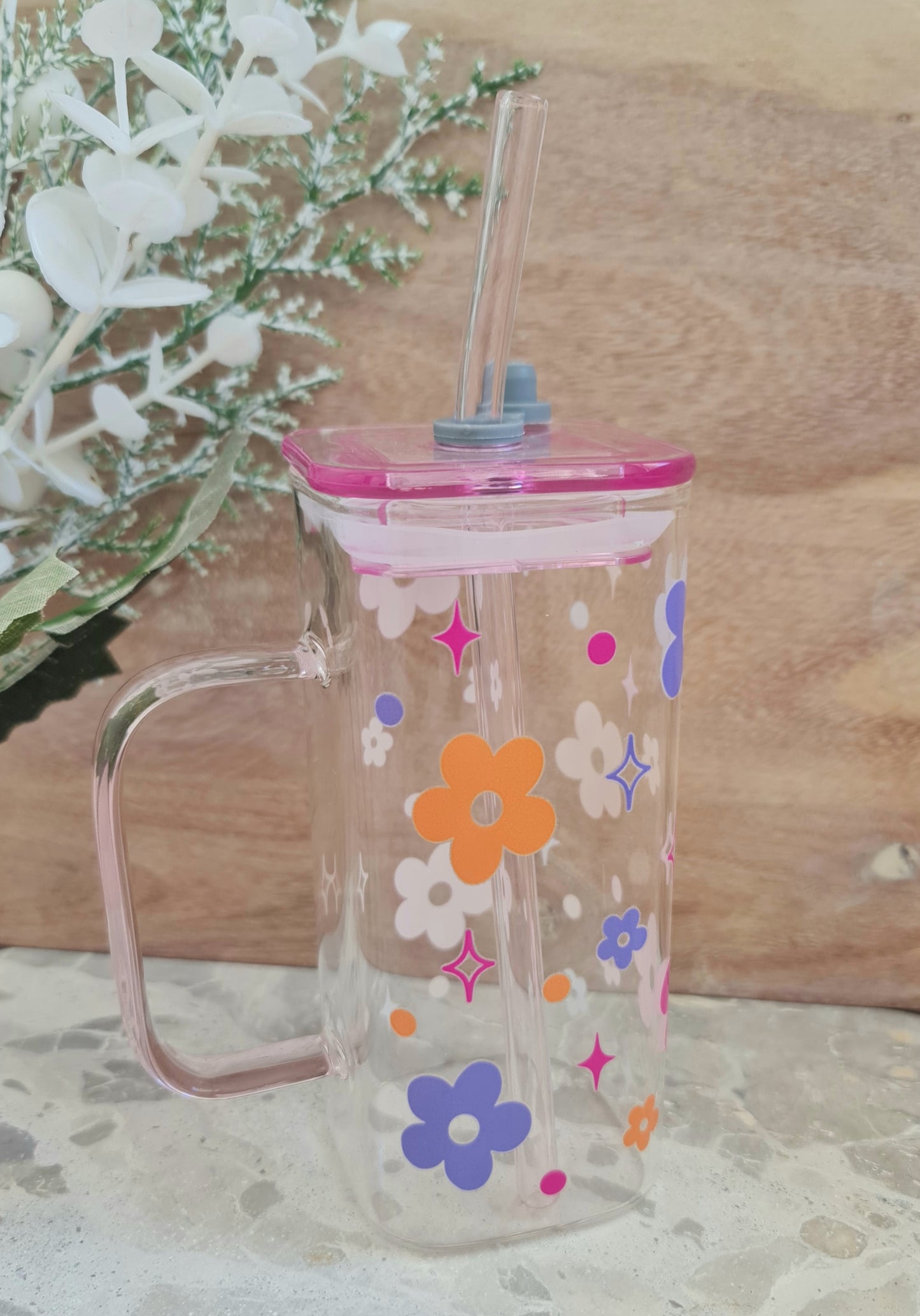 Floral glass cup with a handle